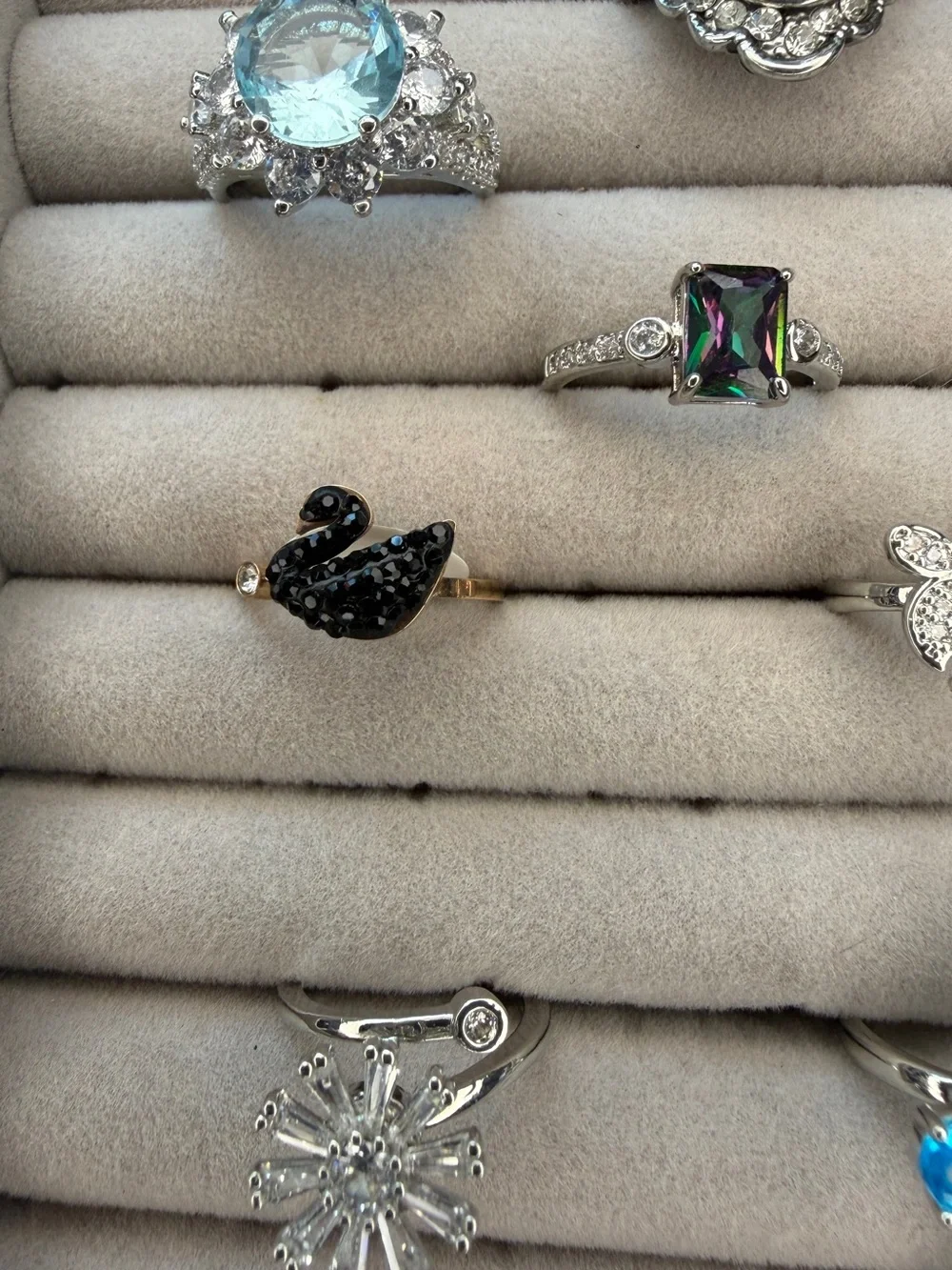 Lot of eight Silver tone Rings-adjustable or size 6-8